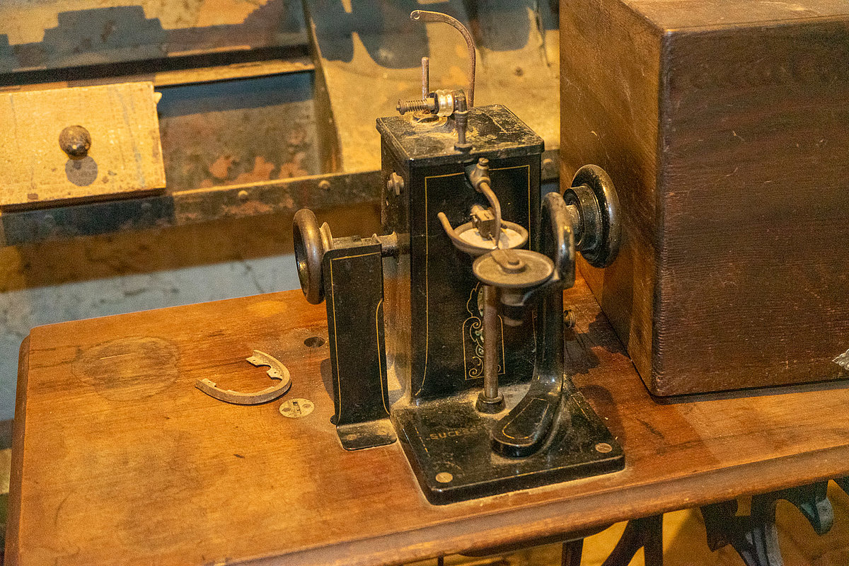 Hutmaschine um 1900